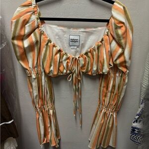 Autumn Adeigbo Orange and White Striped Blouse